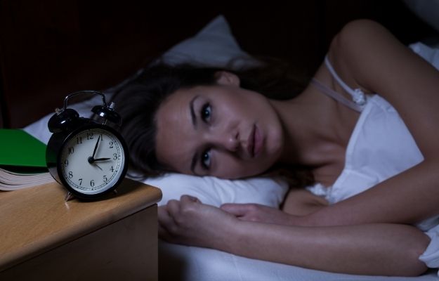 a woman cannot sleep next to a clock | Signs and Symptoms of Low Progesterone | Hormone Health: Signs of Low Progesterone