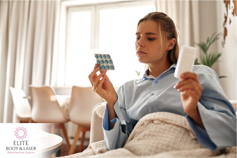 woman taking meds